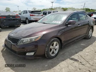 2014 Kia Optima LX z VIN 5XXGM4A7XEG277136, wystawiony jako Copart lot #56146175 z przebiegiem 196 020 mil mil oraz Szkoda całkowita • Salvage title. Historia ofert i sprzedaży dostępna na DreamBid. Obrazek 1.