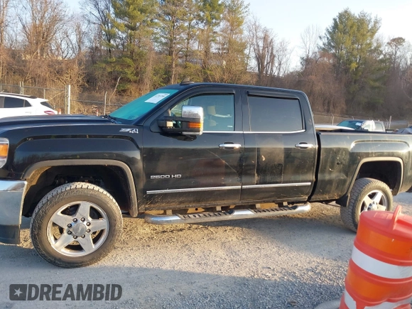 2015 GMC Sierra 2500HD available WiFi SLT with VIN 1GT12ZEG7FF606328, listed as a IAAI auction lot 41793799 with 94,107 mi miles. Bid and sale history available at carsss.com. Image 14.