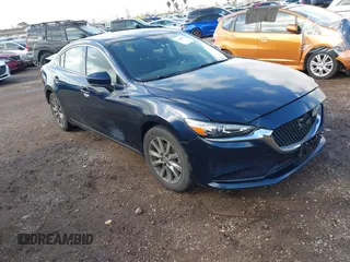 2020 Mazda 6 Sport with VIN JM1GL1UM5L1519519, listed as a IAAI auction lot 41920571 with 59,378 mi miles and . Bid and sale history available at DreamBid. Image 1.