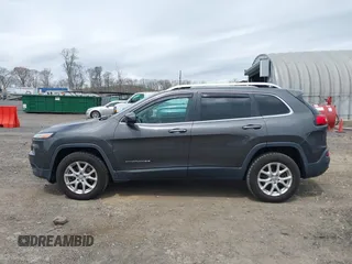 2014 Jeep Cherokee Latitude with VIN 1C4PJMCS5EW201459, listed as a IAAI auction lot 42092653 with 147,430 mi miles. Bid and sale history available at carsss.com. Image 14.
