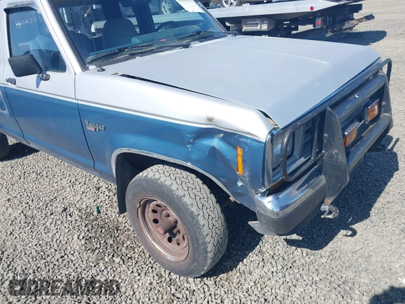 1988 Ford Ranger with VIN 1FTCR15T9JPC14361, listed as a IAAI auction lot 42030315 with 32,201 mi miles. Bid and sale history available at carsss.com. Image 6.
