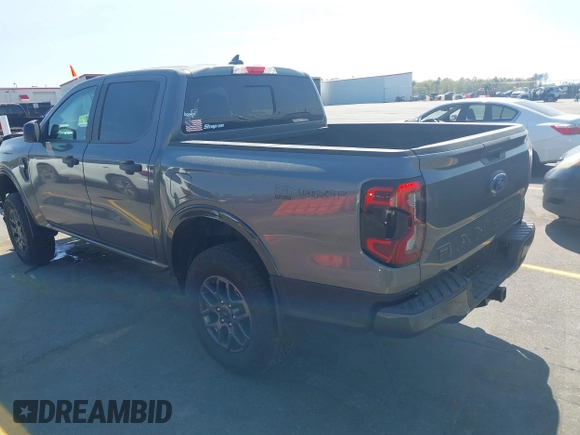 2024 Ford Ranger XLT with VIN 1FTER4GHXRLE46487, listed as a IAAI auction lot 41899384 with 5,570 mi miles. Bid and sale history available at carsss.com. Image 3.