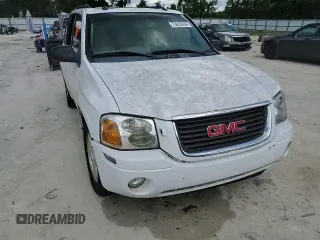 2005 GMC Envoy SLT with VIN 1GKDT13S052311455, listed as a Copart auction lot 73635434 with Not Provided miles and Salvage Title. Bid and sale history available at DreamBid. Image 12.