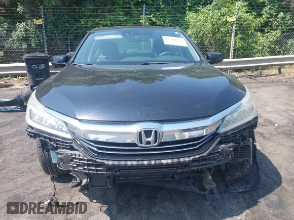 2017 Honda Accord Touring with VIN JHMCR6F74HC005706, listed as a IAAI auction lot 42585878 with 158,388 mi miles and . Bid and sale history available at DreamBid. Image 6.