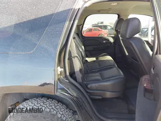 2013 Chevrolet Tahoe LS with VIN 1GNSCAE03DR193235, listed as a IAAI auction lot 41604766 with 204,455 mi miles and . Bid and sale history available at DreamBid. Image 8.