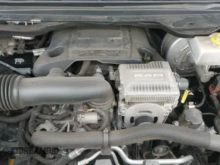 2019 Ram 1500 Rebel z VIN 1C6SRFLT2KN534007, wystawiony jako IAAI lot #43375553 z przebiegiem 113 737 mil mil oraz . Historia ofert i sprzedaży dostępna na DreamBid. Obrazek 21.