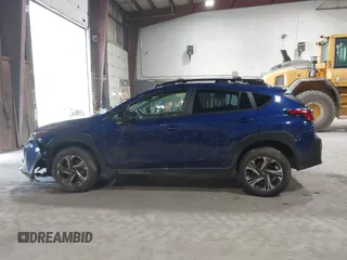 2024 Subaru Crosstrek Premium z VIN JF2GUADC3R8318644, wystawiony jako IAAI lot #42558586 z przebiegiem 33 648 mil mil oraz . Historia ofert i sprzedaży dostępna na DreamBid. Obrazek 14.