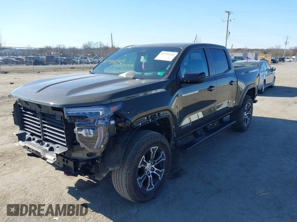2023 GMC Canyon 4WD AT4 with VIN 1GTP6DEK1P1174713, listed as a IAAI auction lot 41733242 with 35,705 mi miles. Bid and sale history available at carsss.com. Image 2.