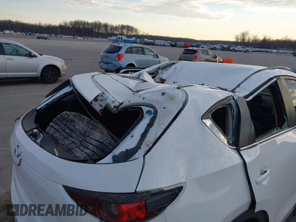 2019 Mazda CX-5 Sport with VIN JM3KFABMXK1655302, listed as a IAAI auction lot 41901293 with 140,369 mi miles and . Bid and sale history available at DreamBid. Image 6.