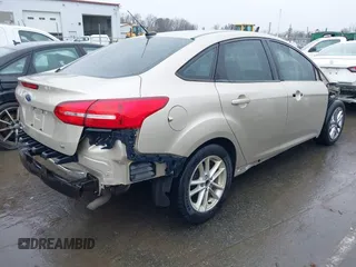2018 Ford Focus SE with VIN 1FADP3F27JL219423, listed as a IAAI auction lot 41575274 with 73,574 mi miles. Bid and sale history available at carsss.com. Image 4.