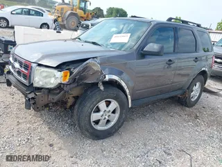 2009 Ford Escape XLT with VIN 1FMCU93G69KC27205, listed as a IAAI auction lot 40152013 with 187,084 mi miles. Bid and sale history available at carsss.com. Image 2.