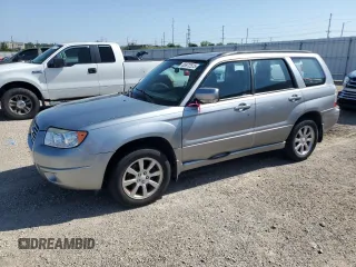 2008 Subaru Forester X z VIN JF1SG65648H700286, wystawiony jako Copart lot #65972525 z przebiegiem 168 832 mil mil oraz Czysty tytuł • Clean title. Historia ofert i sprzedaży dostępna na DreamBid. Obrazek 1.