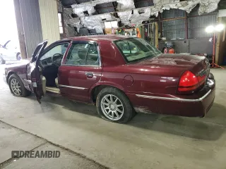 2004 Mercury Grand Marquis GS with VIN 2MEFM74W24X627374, listed as a Copart auction lot 50508605 with 118,635 mi miles and Salvage Title. Bid and sale history available at DreamBid. Image 2.