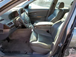 2002 BMW 7 Series 745i with VIN WBAGL63462DP57016, listed as a Copart auction lot 81025594 with 121,870 mi miles and Salvage Title. Bid and sale history available at DreamBid. Image 7.