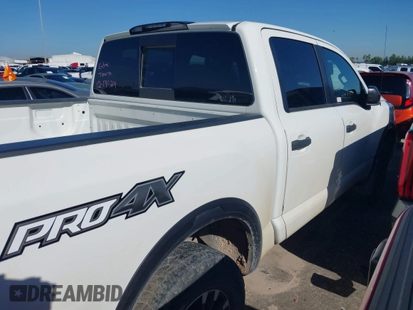 2021 Nissan Titan Pro-4X with VIN 1N6AA1ED5MN533759, listed as a IAAI auction lot 41203812 with 39,154 mi miles and . Bid and sale history available at DreamBid. Image 14.