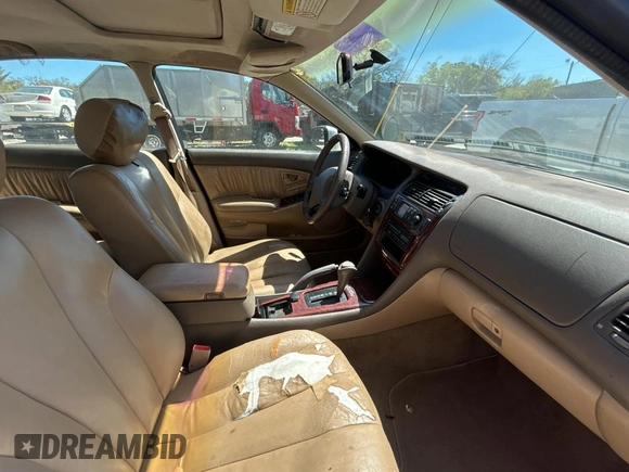 2000 Mitsubishi Diamante LS z VIN 6MMAP67P4YT001142, wystawiony jako Copart lot #49667135 z przebiegiem 243 861 mil mil oraz Tytuł czysty. Historia ofert i sprzedaży dostępna na DreamBid. Obrazek 5.