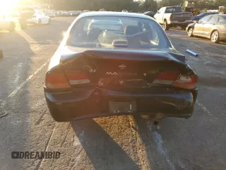 1998 Nissan Maxima GXE с VIN JN1CA21D6WT533634, выставлен на аукционе Copart как лот 83339404 с пробегом 180 356 миль миль и Списание • Salvage title. История ставок и продаж доступна на DreamBid. Изображение 6.