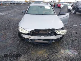 2013 BMW 3 Series 335i with VIN WBA3A9C50DF475024, listed as a IAAI auction lot 40884045 with 120,121 mi miles. Bid and sale history available at carsss.com. Image 6.