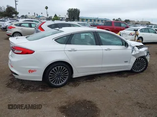 2017 Ford Fusion Titanium with VIN 3FA6P0SU2HR379834, listed as a IAAI auction lot 42440382 with 55,646 mi miles and . Bid and sale history available at DreamBid. Image 13.