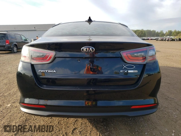 2014 Kia Optima Hybrid EX with VIN KNAGN4AD7E5068408, listed as a Copart auction lot 71589104 with 134,198 mi miles and Salvage Title. Bid and sale history available at carsss.com. Image 6.