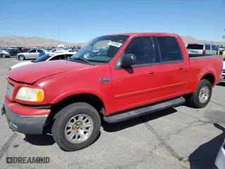 2001 Ford F-150 SuperCrew XLT with VIN 1FTRW08L51KE67795, listed as a Copart auction lot 75872894 with 0 mi miles and Salvage Title. Bid and sale history available at carsss.com. Image 1.