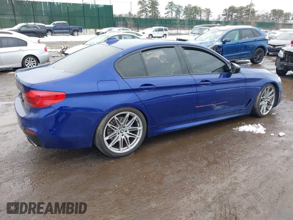 2018 BMW 5 Series 540i xDrive with VIN WBAJE7C5XJWC56733, listed as a IAAI auction lot 41558451 with 67,460 mi miles and . Bid and sale history available at DreamBid. Image 4.
