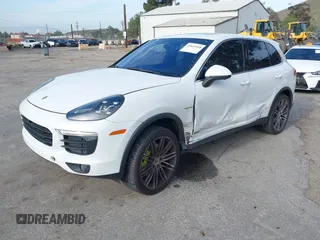 2016 Porsche Cayenne S E-Hybrid with VIN WP1AE2A25GLA58503, listed as a IAAI auction lot 41815568 with 140,635 mi miles and . Bid and sale history available at DreamBid. Image 2.