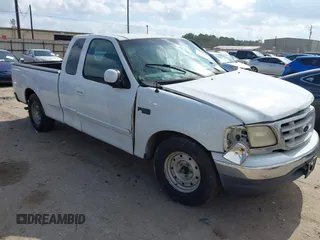 1999 Ford F-150 with VIN 1FTRX17W1XKA24244, listed as a IAAI auction lot 41512867 with Not Provided miles and . Bid and sale history available at DreamBid. Image 1.