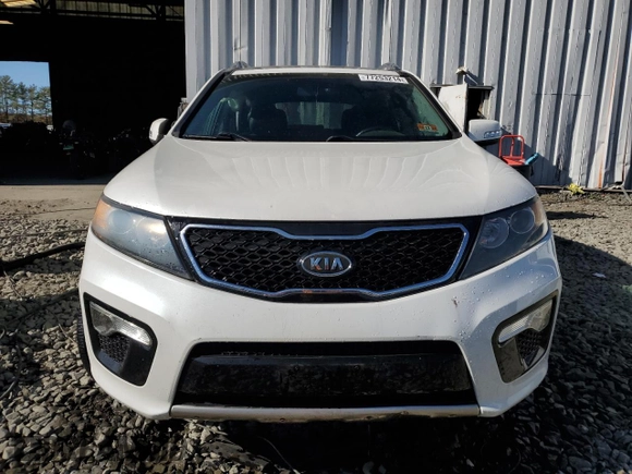 2012 Kia Sorento SX with VIN 5XYKWDA29CG255081, listed as a Copart auction lot 77253214 with 135,156 mi miles and Salvage Title. Bid and sale history available at carsss.com. Image 5.