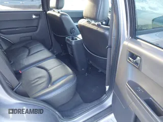 2008 Mercury Mariner Premier with VIN 4M2CU97128KJ38119, listed as a IAAI auction lot 41213121 with 76,699 mi miles and . Bid and sale history available at DreamBid. Image 8.
