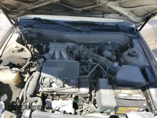 1996 Toyota Camry LE with VIN 4T1BF12K3TU132870, listed as a Copart auction lot 58052975 with 88,210 mi miles and Salvage title. Bid and sale history available at DreamBid. Image 11.