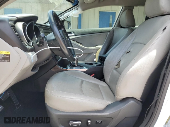 2015 Kia Optima EX with VIN 5XXGN4A71FG493133, listed as a Copart auction lot 52782495 with 115,253 mi miles and Salvage Title. Bid and sale history available at DreamBid. Image 7.