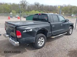 2004 Dodge Dakota SLT z VIN 1D7HG48N54S664848, wystawiony jako IAAI lot #42152635 z przebiegiem 153 824 mil mil oraz . Historia ofert i sprzedaży dostępna na DreamBid. Obrazek 4.
