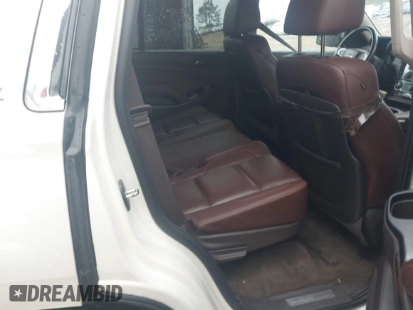 2015 Chevrolet Tahoe LTZ with VIN 1GNSCCKC1FR265370, listed as a IAAI auction lot 42131294 with 217,064 mi miles and . Bid and sale history available at DreamBid. Image 8.