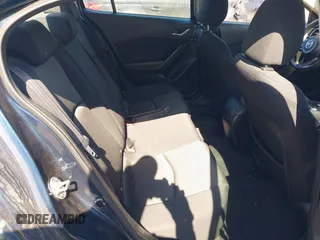 2018 Mazda 3 Sport with VIN 3MZBN1U77JM162467, listed as a IAAI auction lot 41821629 with 98,782 mi miles and . Bid and sale history available at DreamBid. Image 8.