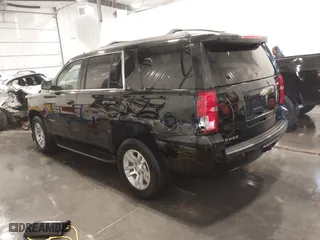 2020 Chevrolet Tahoe LT with VIN 1GNSKBKC2LR123473, listed as a IAAI auction lot 41782983 with 86,980 mi miles. Bid and sale history available at carsss.com. Image 3.