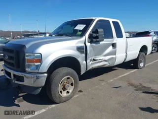 2003 Ford Super Duty F-350 SRW XL with VIN 1FTSX31L83EB98073, listed as a IAAI auction lot 41582135 with 255,455 mi miles. Bid and sale history available at carsss.com. Image 2.