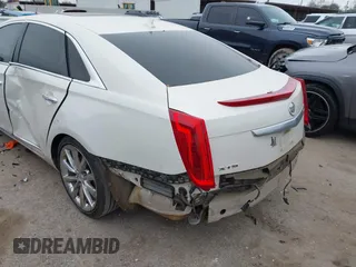 2014 Cadillac XTS Luxury with VIN 2G61M5S35E9303899, listed as a IAAI auction lot 41630891 with 1 mi miles. Bid and sale history available at carsss.com. Image 6.