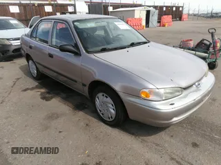 1998 Chevrolet Prizm Lsi with VIN 1Y1SK5285WZ438757, listed as a IAAI auction lot 41896020 with 106,369 mi miles. Bid and sale history available at carsss.com. Image 1.