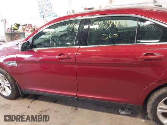 2015 Ford Taurus SEL with VIN 1FAHP2E82FG124009, listed as a IAAI auction lot 42323744 with 159,196 mi miles and . Bid and sale history available at DreamBid. Image 14.