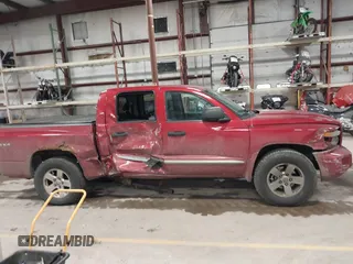 2008 Dodge Dakota Laramie z VIN 1D7HW58N98S634217, wystawiony jako IAAI lot #41739357 z przebiegiem 263 329 mil mil oraz . Historia ofert i sprzedaży dostępna na DreamBid. Obrazek 13.