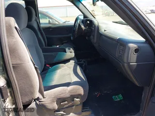 2002 Chevrolet Silverado 1500 LT with VIN 2GCEK19T821314733, listed as a IAAI auction lot 42057566 with 244,783 mi miles. Bid and sale history available at carsss.com. Image 5.