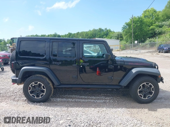 2017 Jeep Wrangler Unlimited Rubicon Recon z VIN 1C4HJWFG4HL507601, wystawiony jako IAAI lot #42258921 z przebiegiem 106 122 mil mil oraz . Historia ofert i sprzedaży dostępna na DreamBid. Obrazek 14.