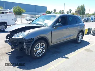 2014 Porsche Cayenne S с VIN WP1AB2A29ELA55755, выставлен на аукционе IAAI как лот 42653023 с пробегом 119 560 миль миль и . История ставок и продаж доступна на DreamBid. Изображение 2.