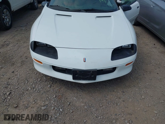 1994 Chevrolet Camaro z VIN 2G1FP22S5R2173095, wystawiony jako IAAI lot #42427396 z przebiegiem 95 713 mil mil oraz . Historia ofert i sprzedaży dostępna na DreamBid. Obrazek 6.