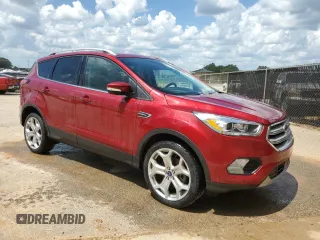 2019 Ford Escape Titanium z VIN 1FMCU0J97KUB20612, wystawiony jako Copart lot #64638415 z przebiegiem 100 102 mil mil oraz Czysty tytuł • Clean title. Historia ofert i sprzedaży dostępna na DreamBid. Obrazek 4.