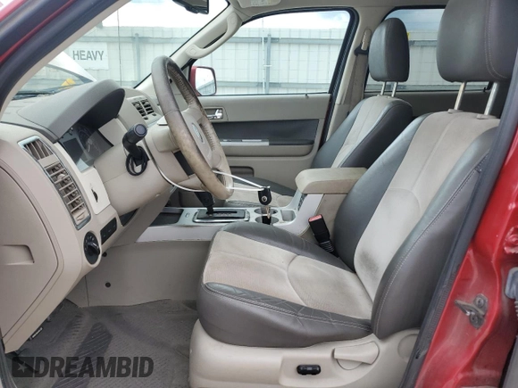 2009 Mercury Mariner Premier with VIN 4M2CU97G39KJ11050, listed as a Copart auction lot 57131665 with 201,602 mi miles and Salvage title. Bid and sale history available at DreamBid. Image 7.
