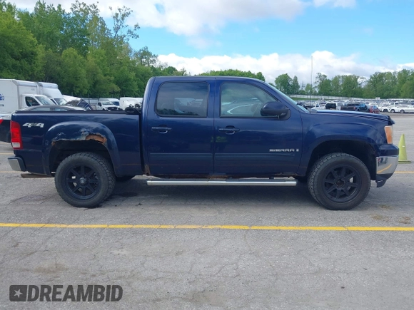 2009 GMC Sierra 1500 z VIN 2GTEK33Y391100131, wystawiony jako IAAI lot #42292487 z przebiegiem 197 968 mil mil oraz . Historia ofert i sprzedaży dostępna na DreamBid. Obrazek 13.