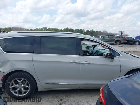 2017 Chrysler Pacifica Limited with VIN 2C4RC1GG9HR560544, listed as a IAAI auction lot 41807810 with 137,768 mi miles and . Bid and sale history available at DreamBid. Image 13.