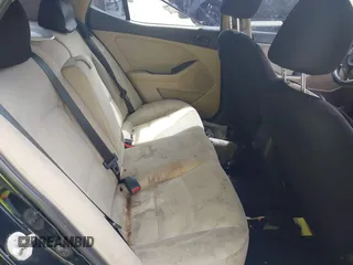 2014 Kia Optima LX z VIN 5XXGM4A77EG322243, wystawiony jako IAAI lot #42334987 z przebiegiem 141 068 mil mil oraz . Historia ofert i sprzedaży dostępna na DreamBid. Obrazek 8.